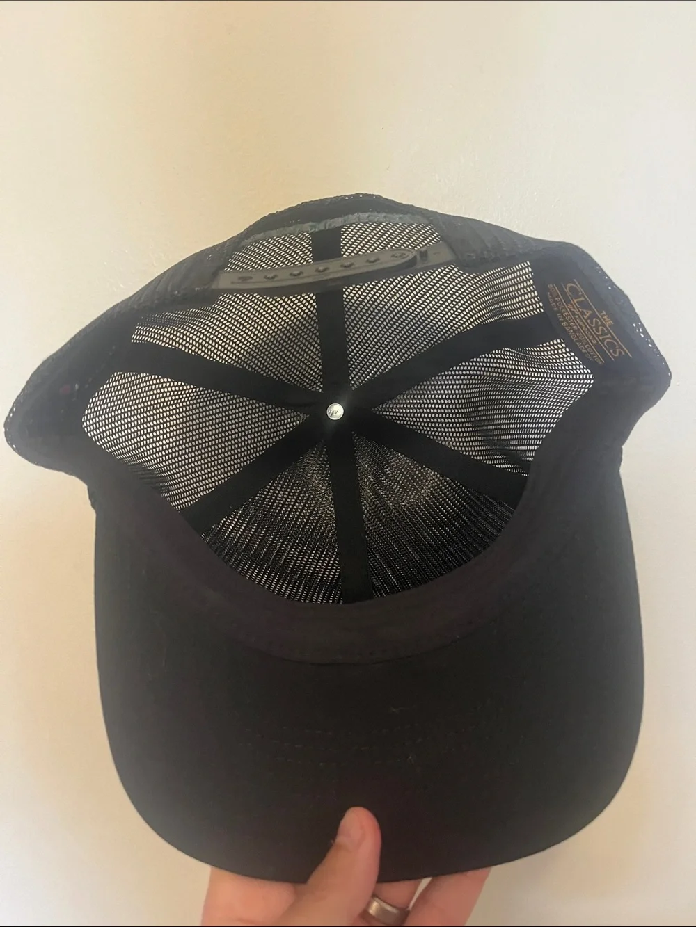 Extracurricular Black Mesh Trucker Cap with White Embroidered Logo